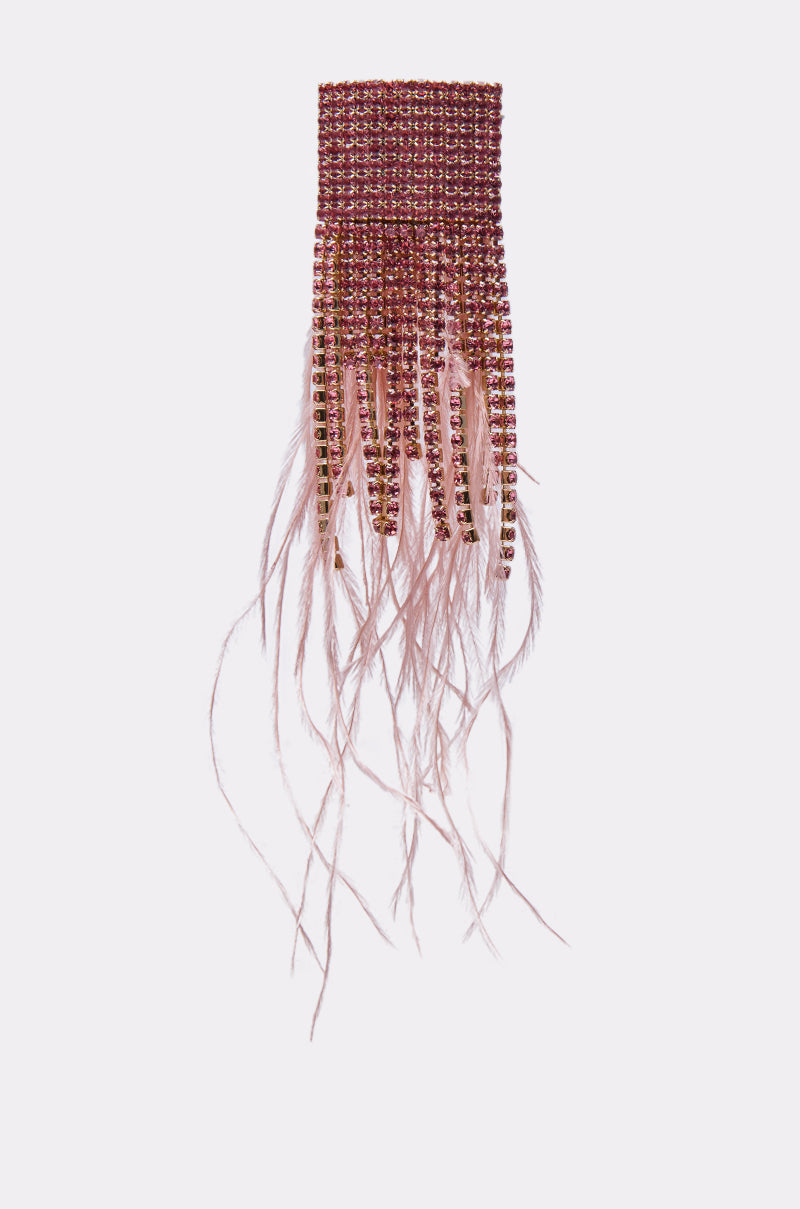 The SHAKE IT EARRING features pink beads, dangling pink crystal chains, and wispy feathers for a glamorous touch—perfect to pair with a beaded brooch for a coordinated look. 5