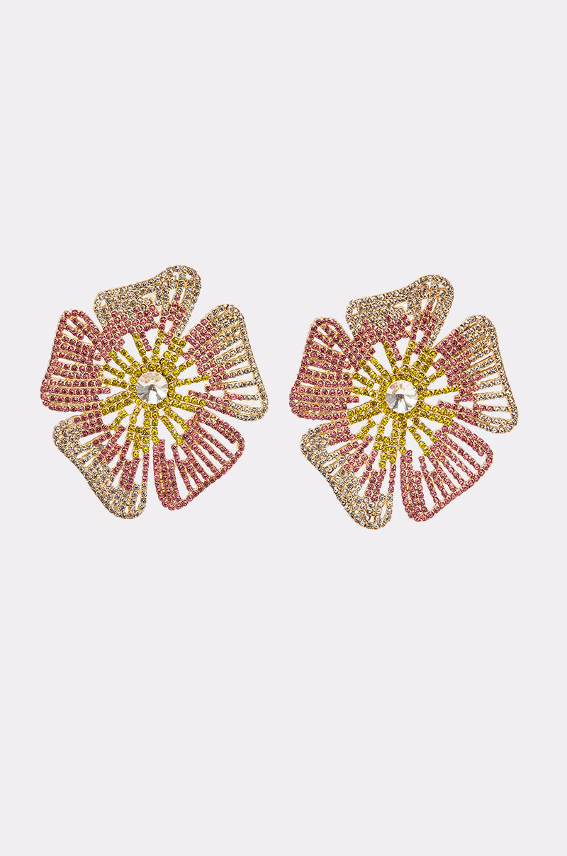 The IM JUST PRETTY EARRING features large openwork floral designs adorned with pink, yellow, and clear rhinestones, showcased against a plain white background. 1