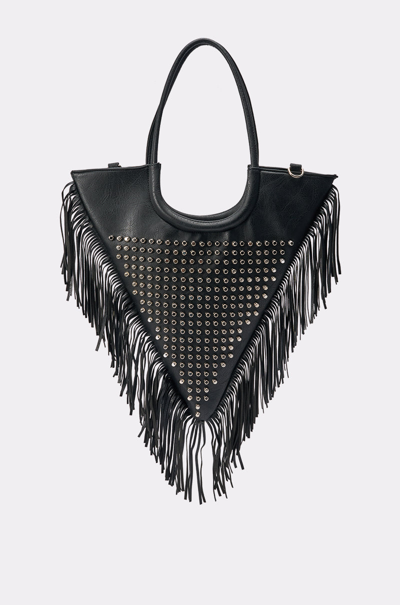 Introducing the TAKE ME OUT STUDDED TOTE: a black triangular festival bag featuring long fringe along the edges, silver studs arranged in rows on the front, and two curved handles at the top. Crafted from durable faux leather, this unique tote offers a stylish and edgy look.