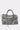 The ROSIE OVERSIZED PU TOTE is a gray faux leather handbag with two handles, a front zipper pocket, decorative studs, and long zipper pull tassels, shown against a plain white background.