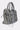 The ROSIE OVERSIZED PU TOTE is a gray faux leather handbag with dual handles, silver studs, a front zip pocket, and long tassels on the zippers, pictured at a three-quarter angle against a light background.