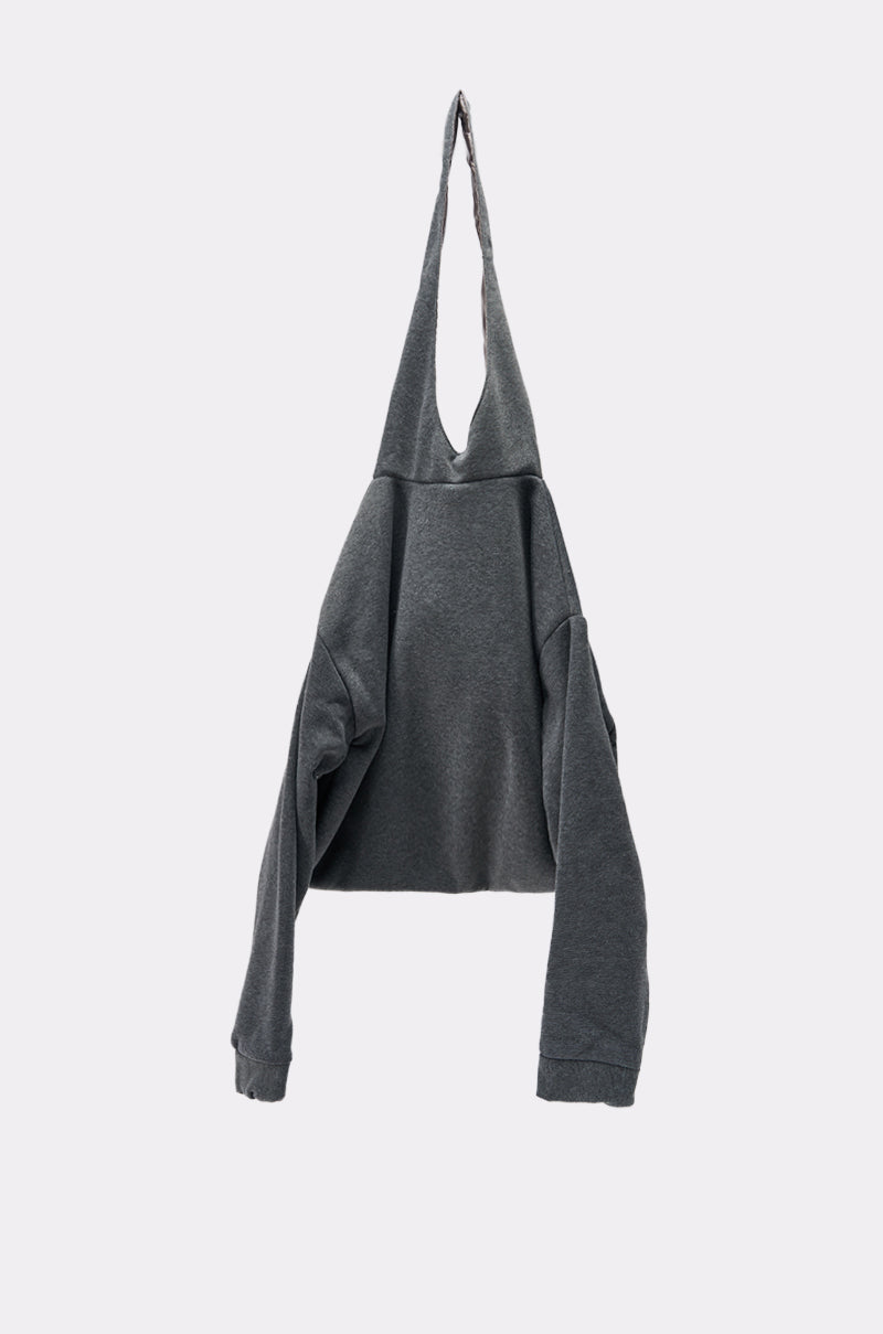 The CARRY ME HOODIE PURSE is a dark gray, long-sleeve sweatshirt with a deep V-neck and an elongated, pointed hood—an eye-catching, street-inspired accessory—displayed against a plain light background.