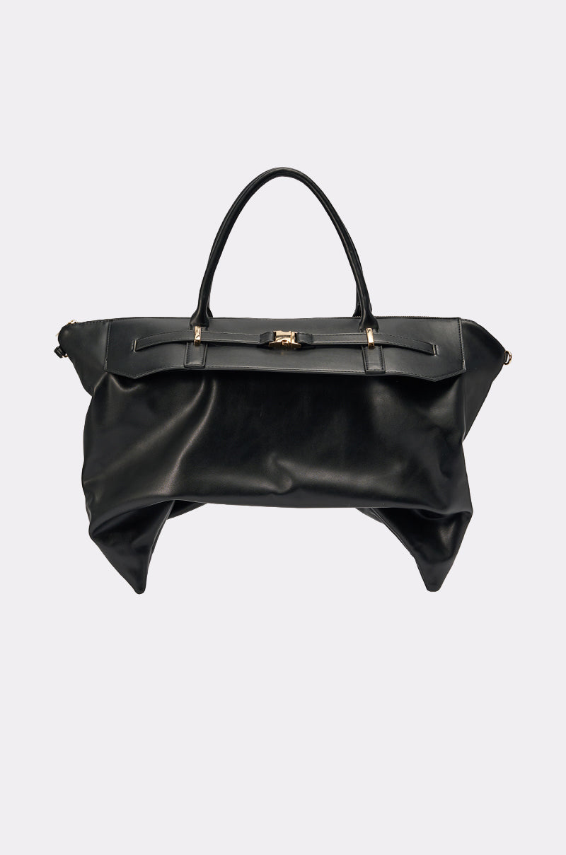 The TAKE A PIC OVERSIZED SLOUCH TOTE is a large black bag with a soft, slouchy shape, two handles, and a gold clasp, shown against a plain light background. 0