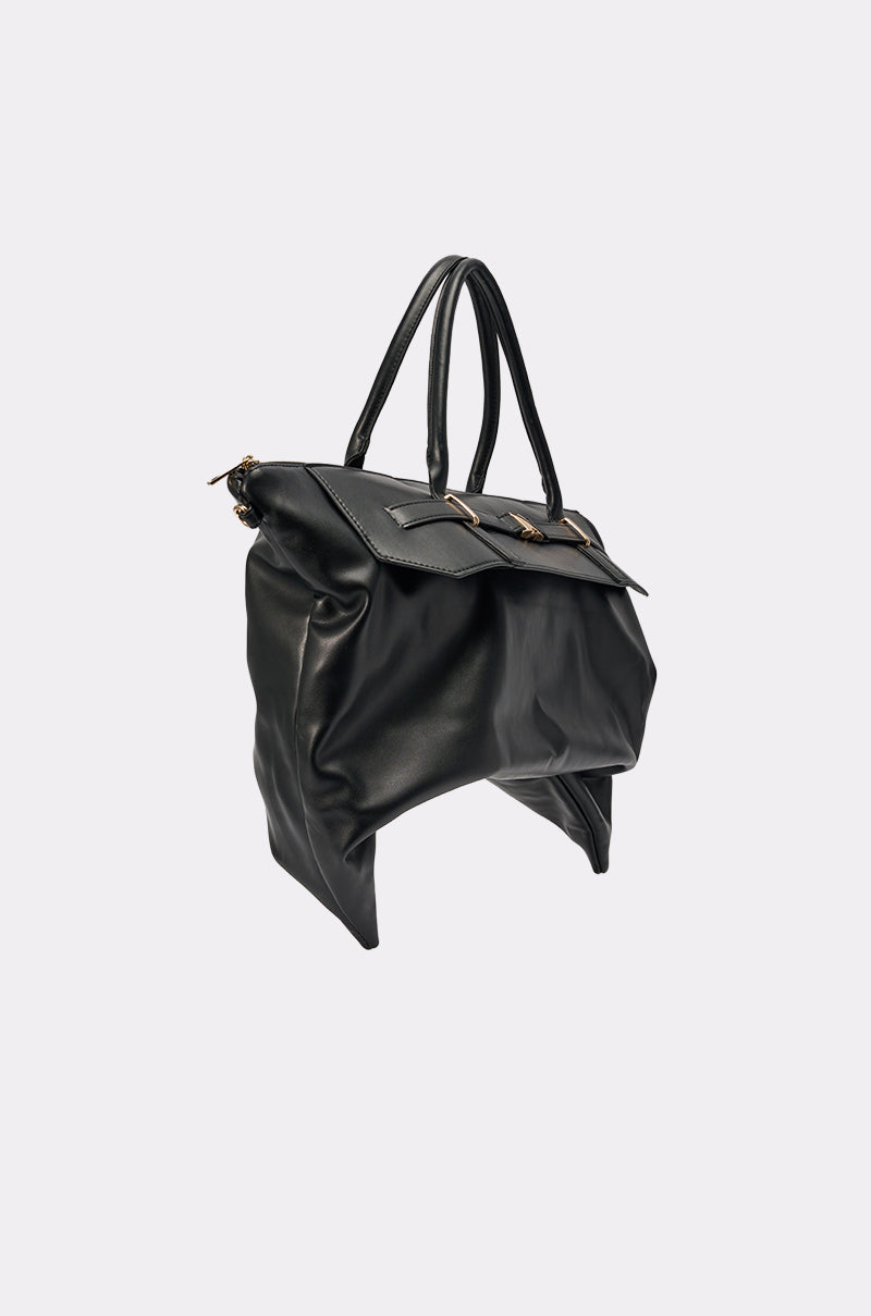 The TAKE A PIC OVERSIZED SLOUCH TOTE, a black leather carryall with two top handles, gold-tone hardware, and a slouchy silhouette, is shown against a plain light gray background. 2