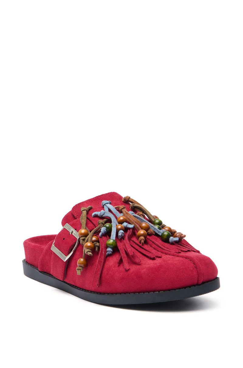 The AZALEA WANG ABEILLE BURGUNDY FAUX SUEDE FRINGE CLOG is a bohemian slip-on mule sandal in red faux suede, featuring a silver buckle, fringe, and multicolored wooden beads—a vibrant update on the classic clog.