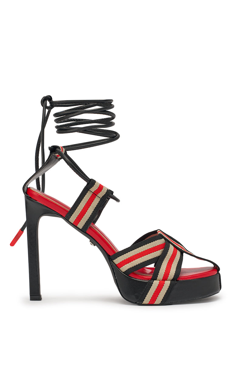 The AZALEA WANG ABILENE BLACK MULTI STRIPPED STRAPPY CHUNKY SANDAL features a black sole and heel, red insole, striped beige/red/black fabric straps, and stylish lace-up ankle ties. 2