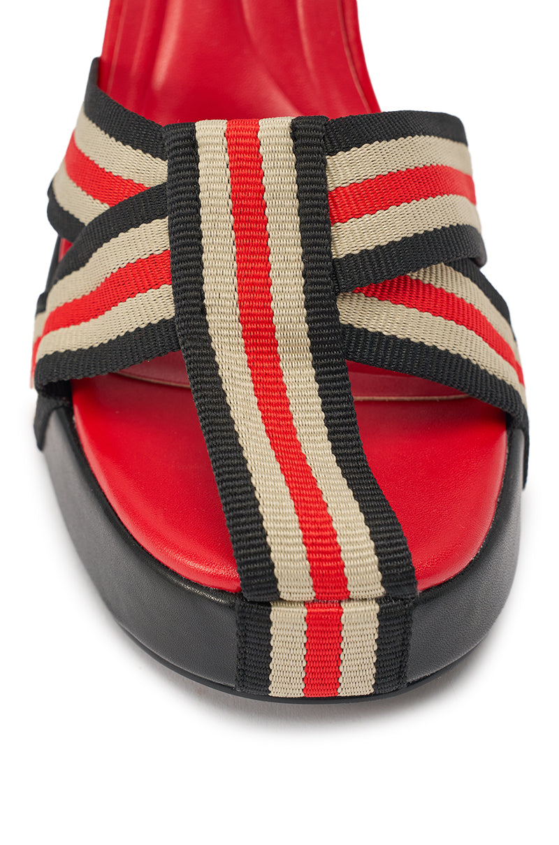 The AZALEA WANG ABILENE Black Multi Striped Strappy Chunky Sandal features a red footbed, black sole, crisscrossing black, beige, and red striped straps across the front, and lace-up ankle ties for added style. 8