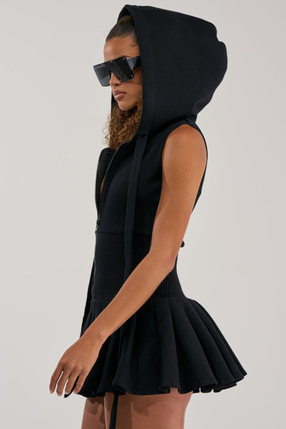 black dress with hood Women's Hoodie in shiny stretch nylon | Our Tompkins Sweatshirt Dress is proof that maximum comfort can still catch the eye REBEL WITH A CAUSE HOODED