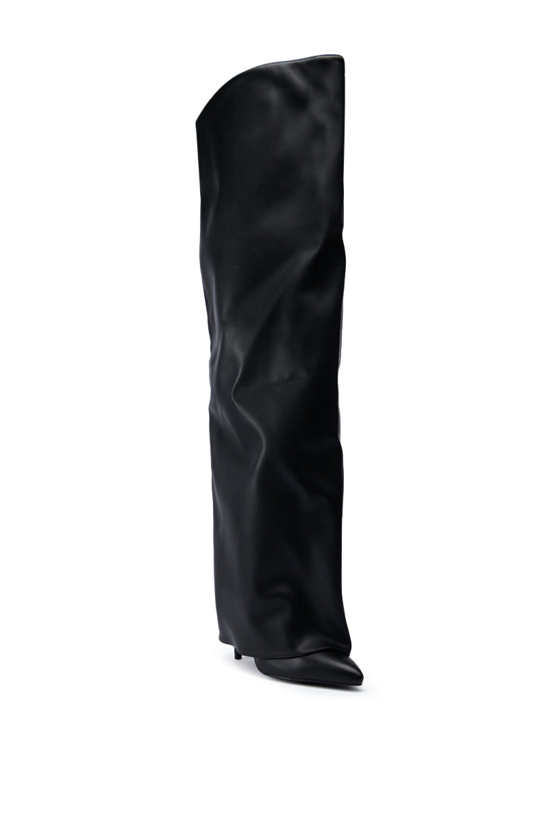 The AZALEA WANG AGUILAR BLACK THIGH HIGH SUSPENDER BOOT features a single, over-the-knee black faux leather style with a slightly slouched design and a sleek stiletto heel, displayed from the side on a white background.