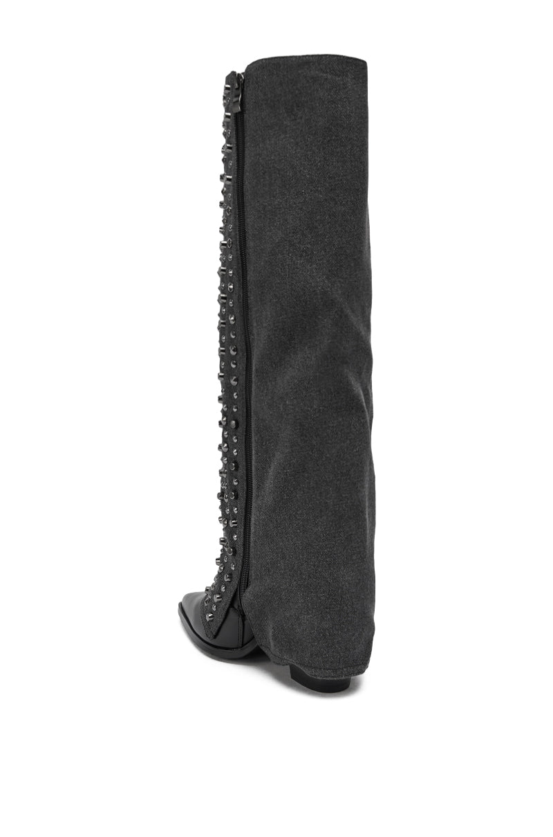 The AZALEA WANG AGUSTUE BLACK STUDDED WESTERN BOOT features a tall, black, soft-textured design with vertical decorative studs, a side zipper, a low chunky heel, and a slightly pointed toe.