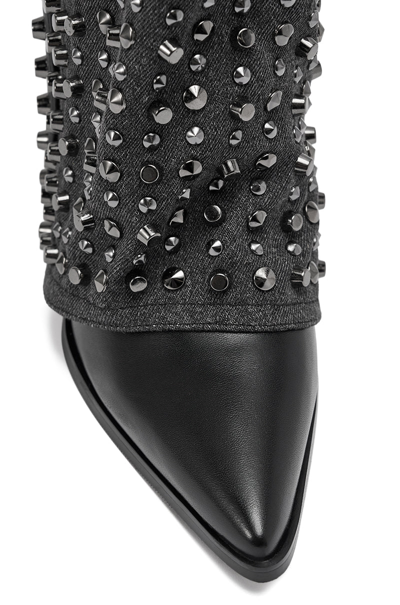 Close-up of the AZALEA WANG AGUSTUE BLACK STUDDED WESTERN BOOT, featuring a textured black upper adorned with shiny silver studs and rounded spikes for a bold, edgy look.