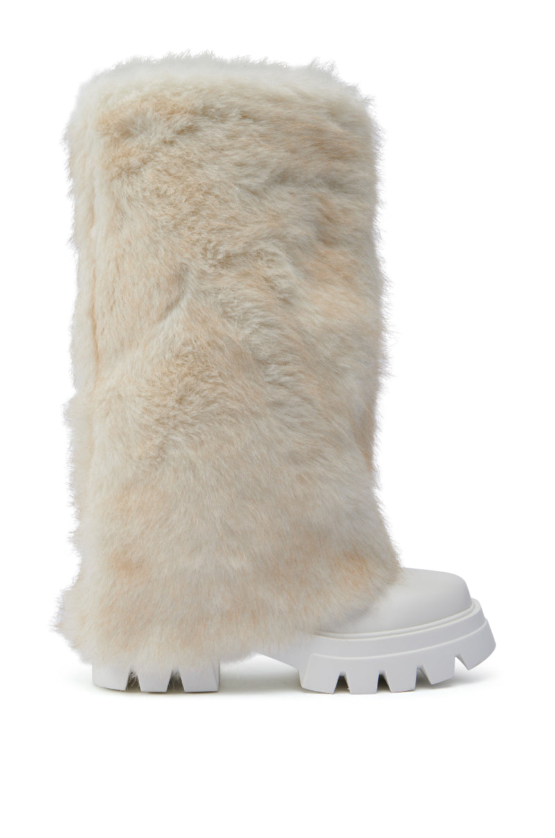 The AZALEA WANG ASHOKA WHITE FUZZY FLATFORM MID CALF BOOT showcases a modern and bold design, featuring thick, creamy off-white faux fur covering the shaft. It pairs seamlessly with a chunky block heel and a white platform sole that boasts deep grooves for enhanced traction.
