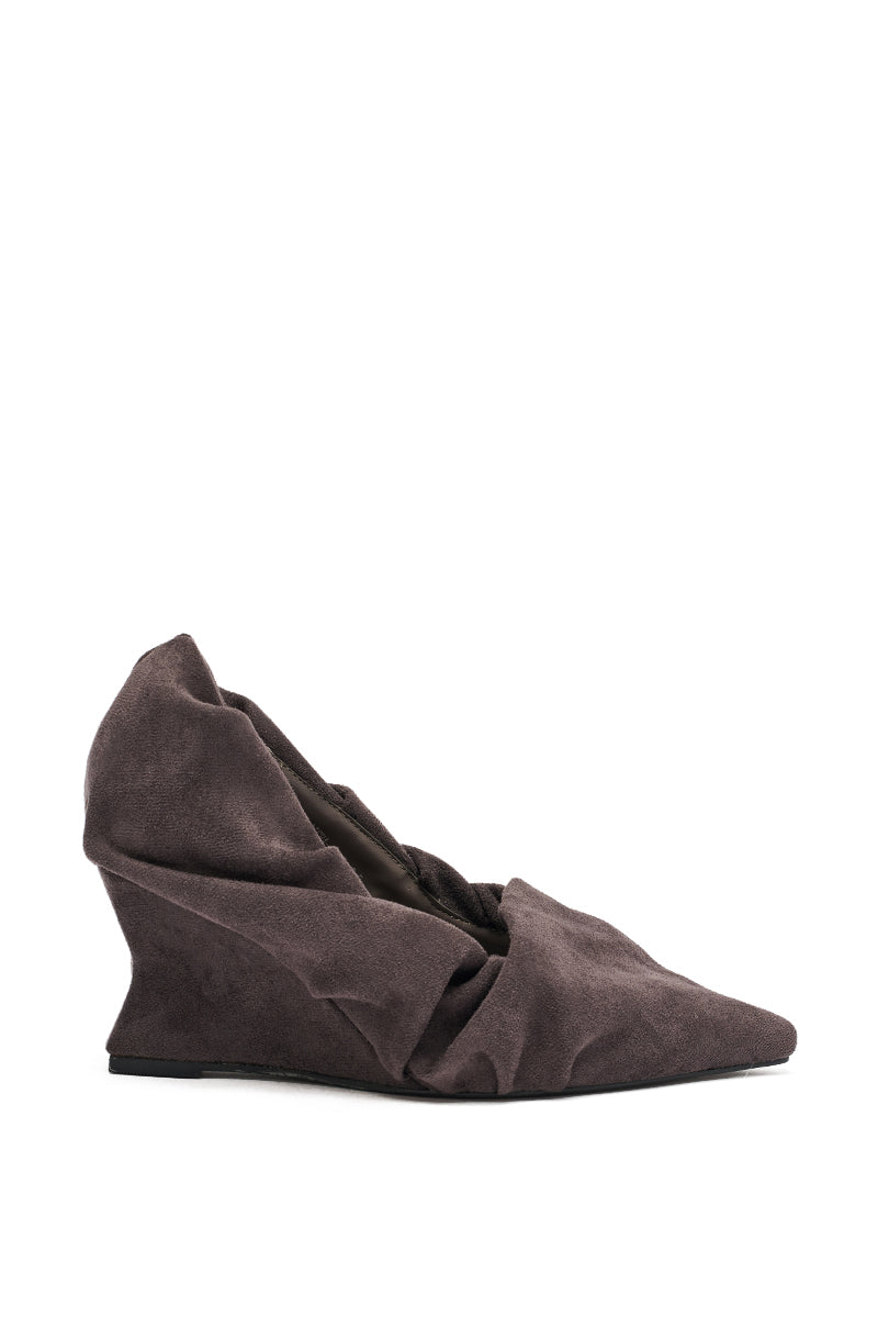 The AZALEA WANG AICHA FAUX SUEDE GRAY RUCHED WEDGE PUMP features a pointed toe, gray faux suede upper, low ruched wedge heel, and a gathered texture along the upper and heel, shown against a white background. 2