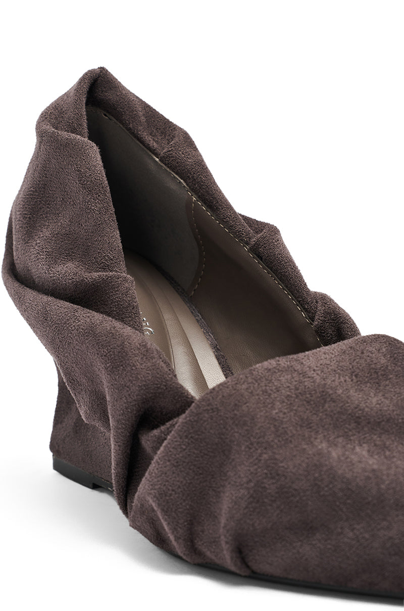 Close-up of the AZALEA WANG AICHA FAUX SUEDE GRAY RUCHED WEDGE PUMP featuring gray faux suede, a unique ruched design around the opening and toe, with visible interior and stitching details. 6