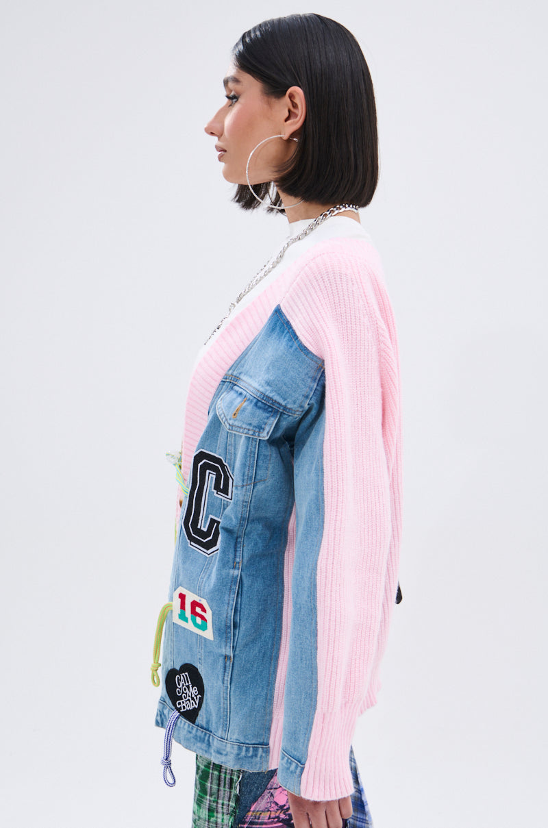 A person with straight, chin-length dark hair and hoop earrings wears the SURGICAL SPLICED CARDIGAN, a hybrid cardigan with knit sleeves and patched denim panels, photographed in profile against a plain light backdrop. 7
