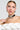 A woman with a sleek hairstyle dons a strapless white top and the elegant Couture Flower Choker Necklace featuring a large silver ornament. Paired with substantial silver earrings, she exudes sophistication, gazing to the side against a plain backdrop.