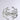 The CUFFED UP BRACELET IN SILVER features abstract, branch-like designs intertwining elegantly. This statement piece beautifully reflects light, accentuating its smooth and modern aesthetic against a plain backdrop.
