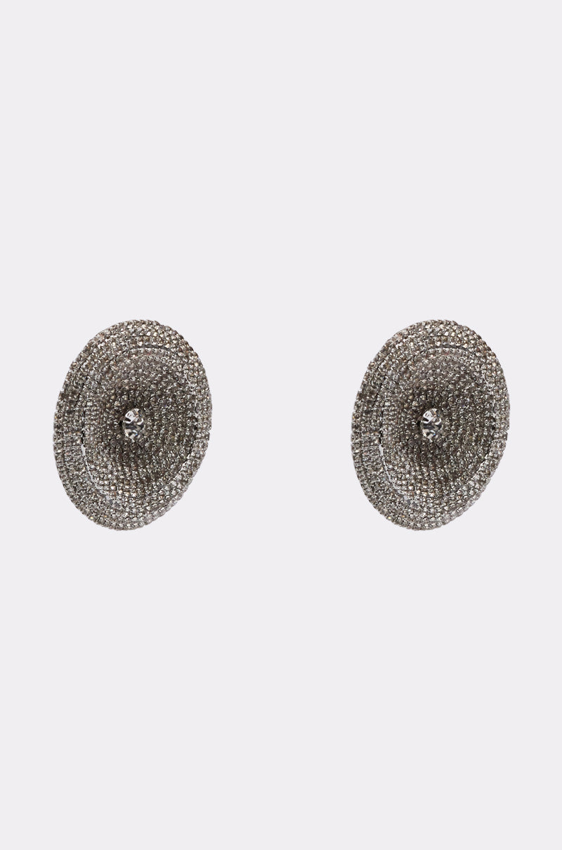 The U WISH EARRING features a pair of round, textured silver statement earrings with a sparkling, woven look, showcased against a plain white background. 2