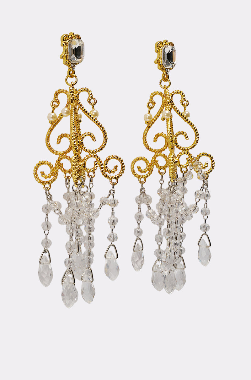SEE MY LIGHT EARRING features gold chandelier earrings with ornate scrollwork and hanging clear crystal beads, offering an elegant vintage design that adds timeless charm and statement style to any outfit. 2