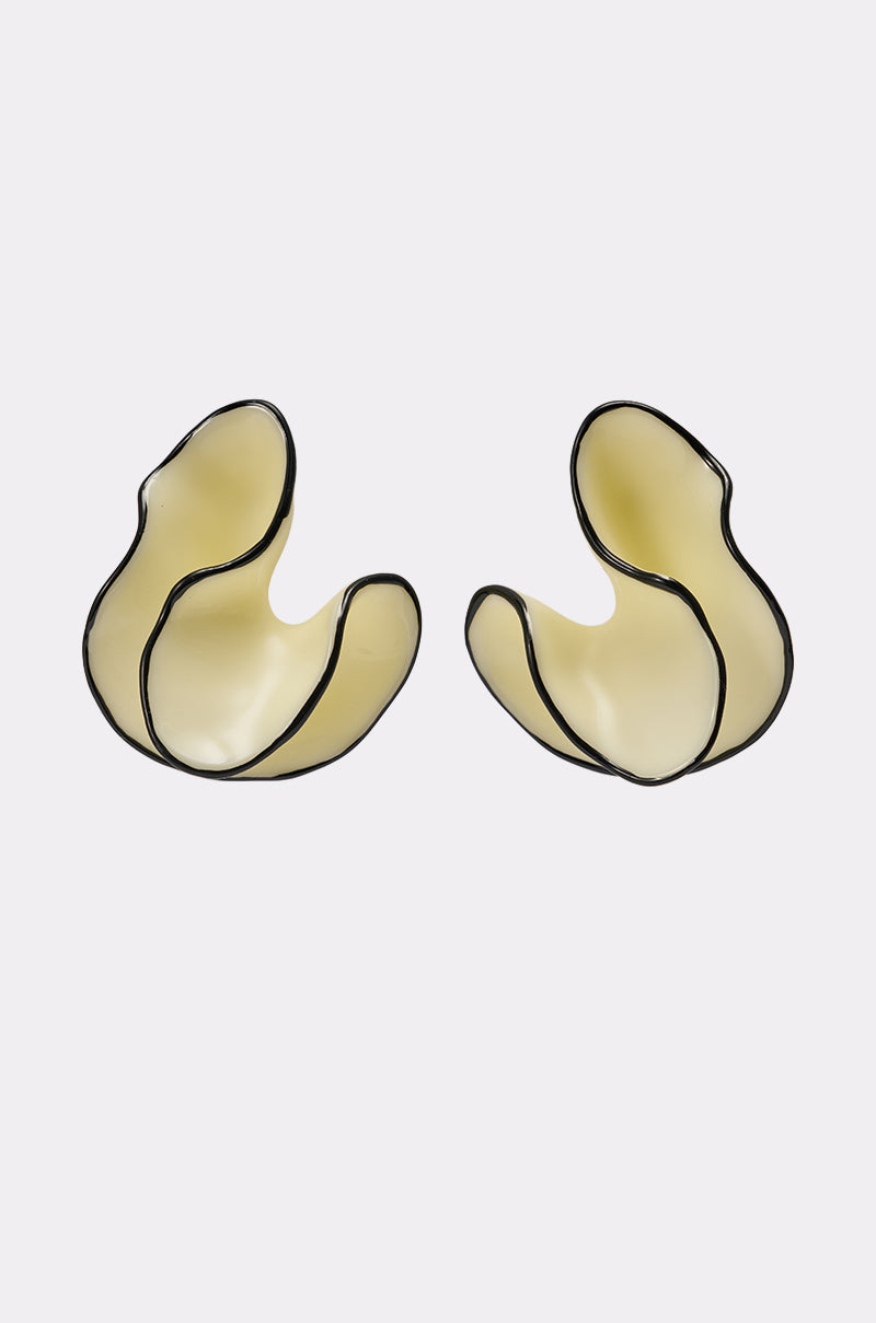The ITS MY WORLD EARRING features cream acrylic with black-edged abstract swirls in organic, petal-like shapes. These modern statement earrings are shown on a plain white background. 0