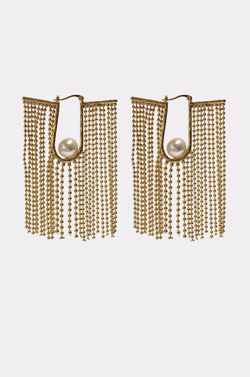 The U DONT GET IT EARRING features gold-tone drop earrings with cascading chain fringe and a single round pearl set in the center of an open, curved gold frame. 0