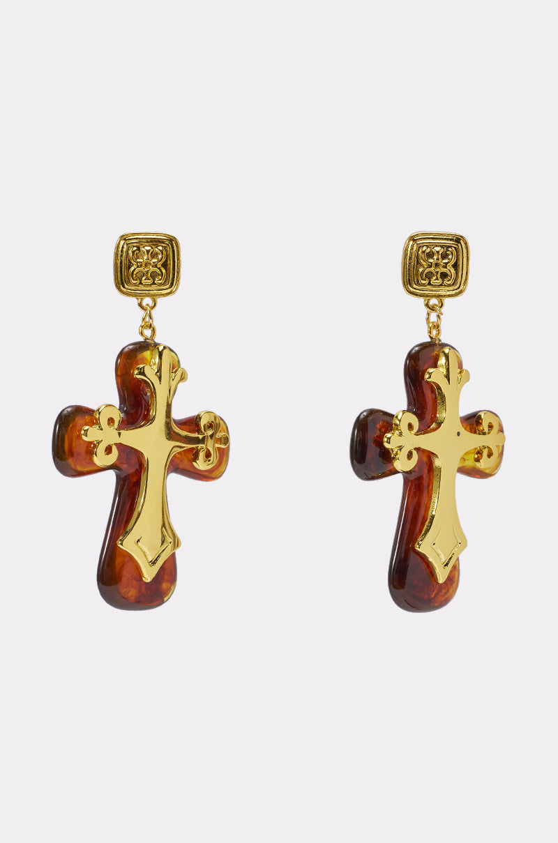 The CROSS MY HEART EARRING features gold square studs paired with brown tortoiseshell cross dangles, each accented by a shiny gold cross detail, all displayed on a plain white background. 0