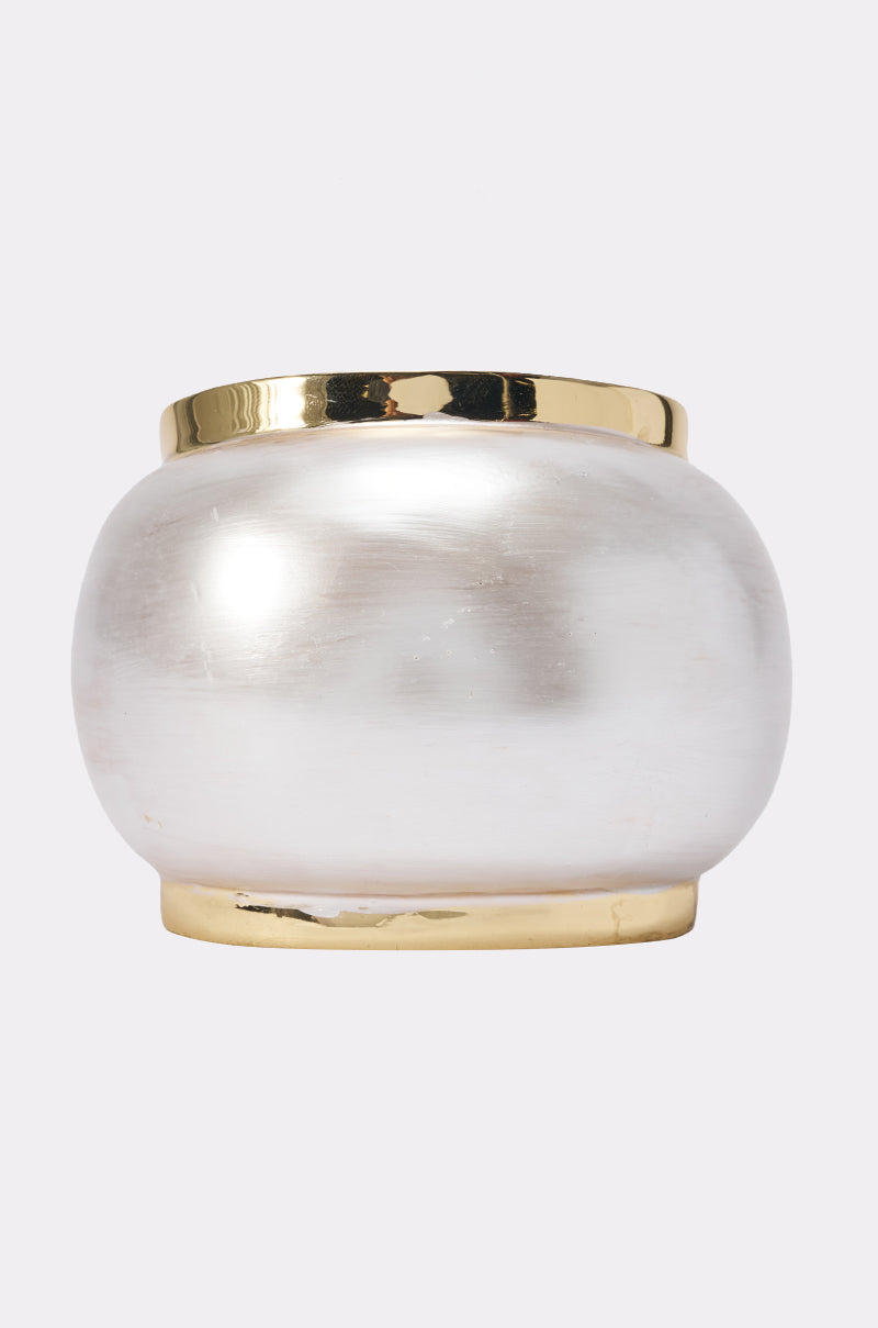 The PEARL BRACELET is a round vase crafted from frosted white glass, featuring a lustrous gold trim accenting both the rim and base—evoking the timeless elegance of bridal jewelry—displayed against a simple, light backdrop.