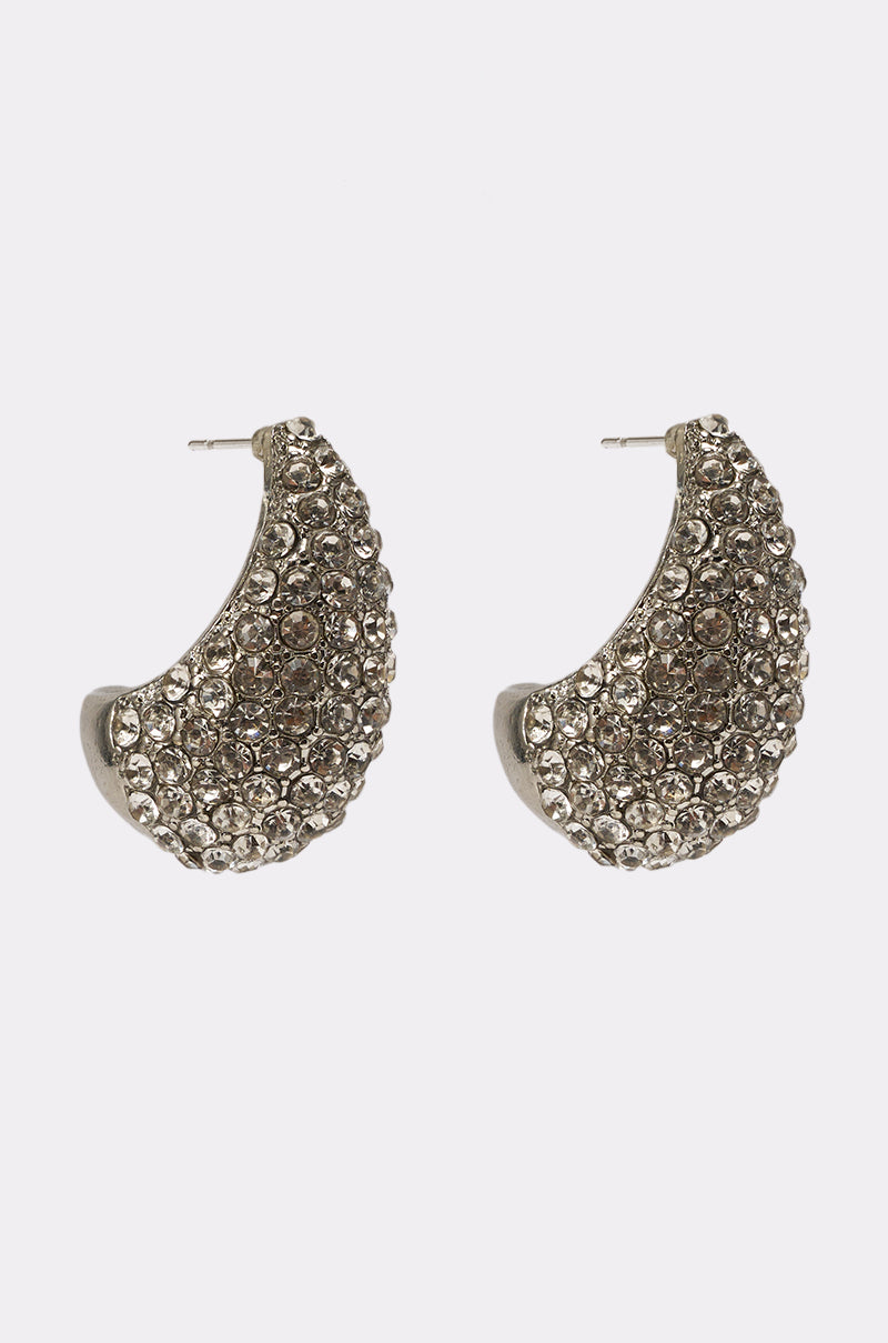The DROPS OF JUPITER EARRING IN SILVER features crescent-shaped silver-tone studs adorned with sparkling rhinestones in a sculptural hoop design. 2