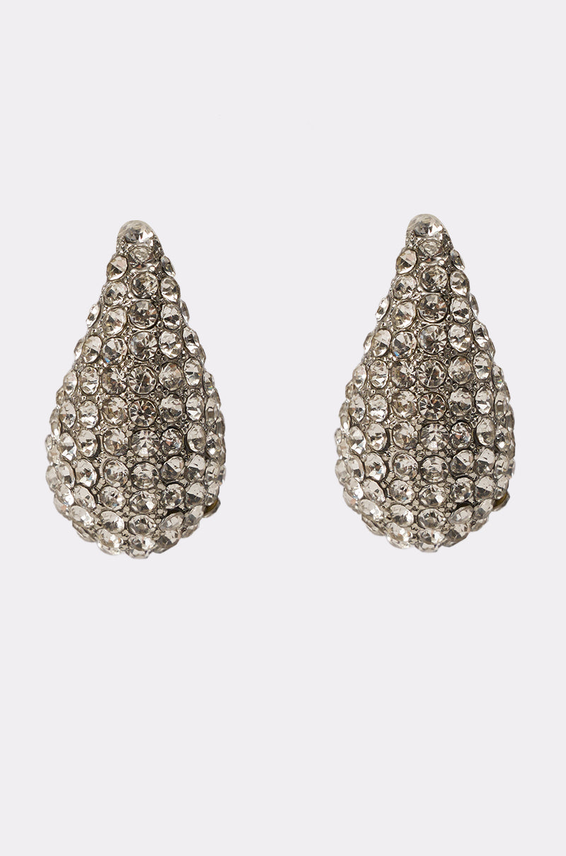 The DROPS OF JUPITER EARRING IN SILVER features a teardrop silhouette adorned with small, round, clear rhinestones and is pictured against a plain white background. 3