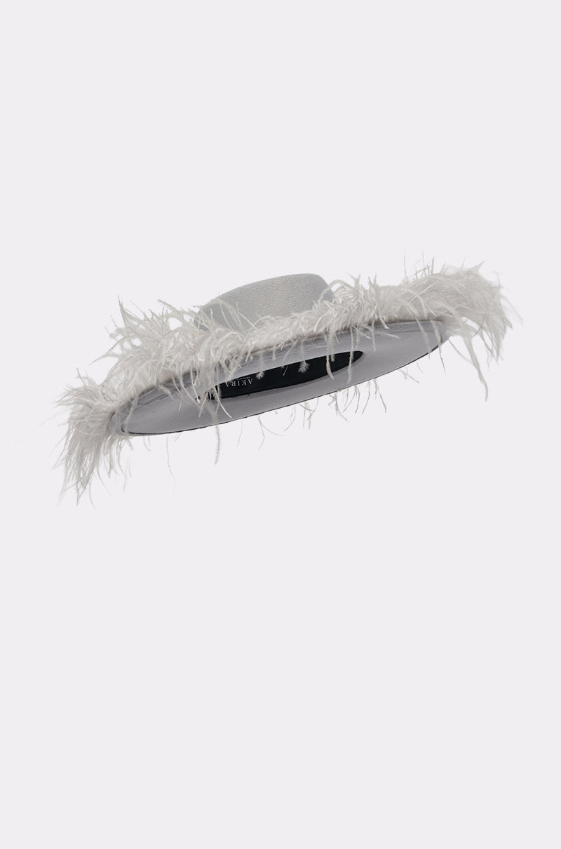 The FEEL IT FEATHER BRIM HAT is a wide-brimmed, light gray hat featuring a pearl trim and soft feather border—an elegant western festival accessory shown against a plain white background. 5