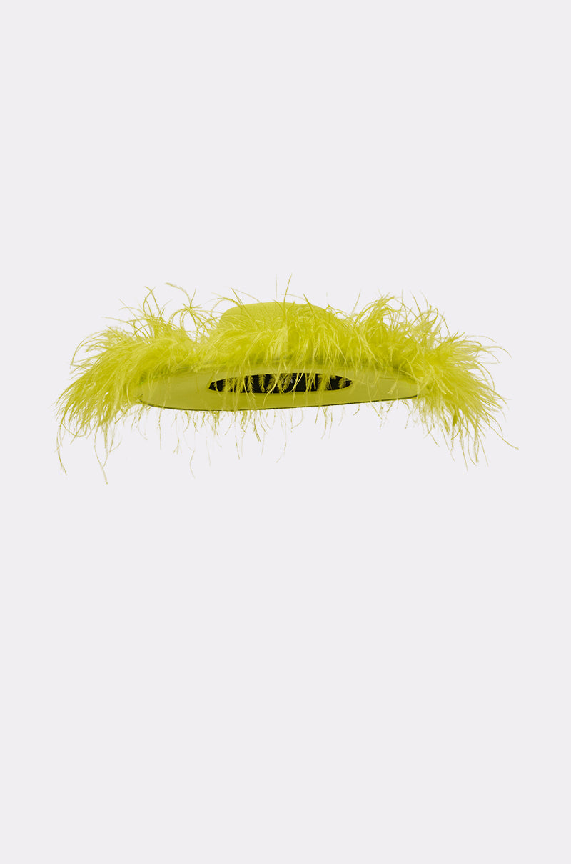 The FEEL IT FEATHER BRIM HAT IN GREEN is a vibrant neon yellow-green cowboy hat with fluffy feathers along the brim, showcased against a plain white background. 3