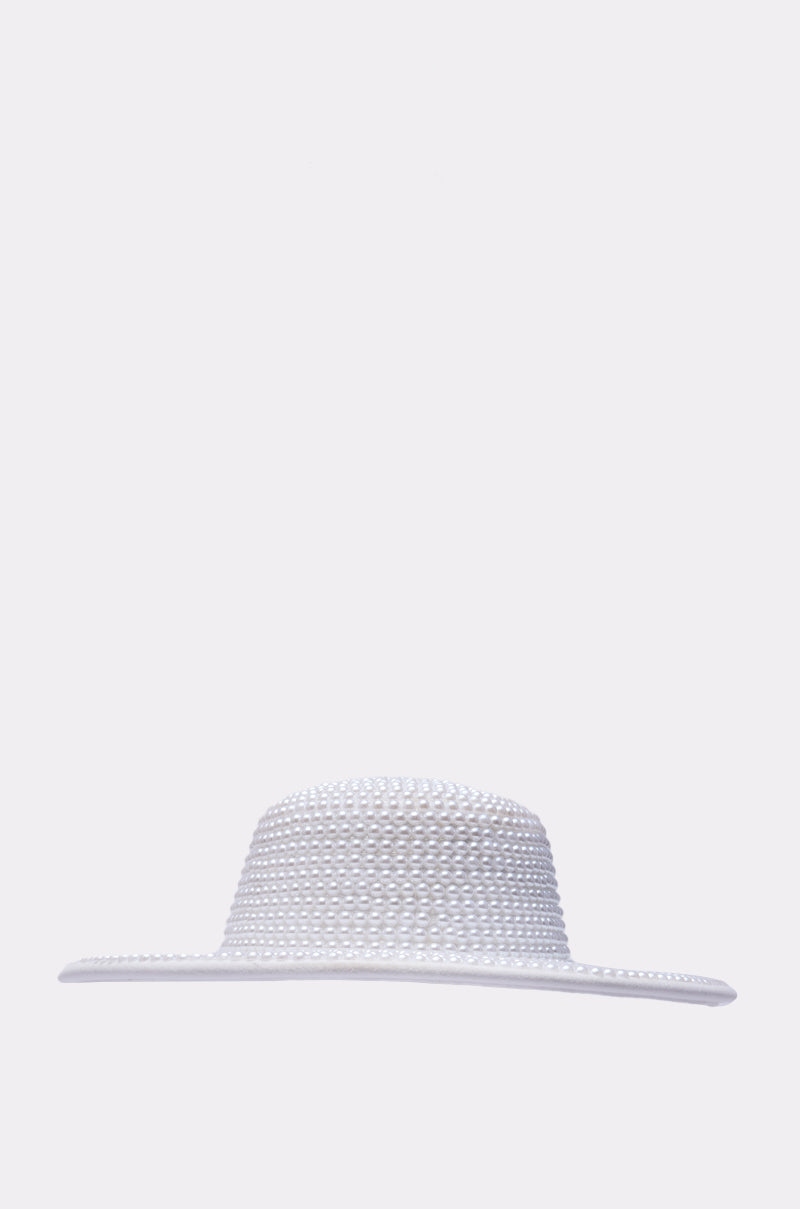 The POLLY PEARL BRIM HAT, a white woven wide-brimmed hat with a chic pearl-accented brim, is shown from the front against a plain light gray background. 3