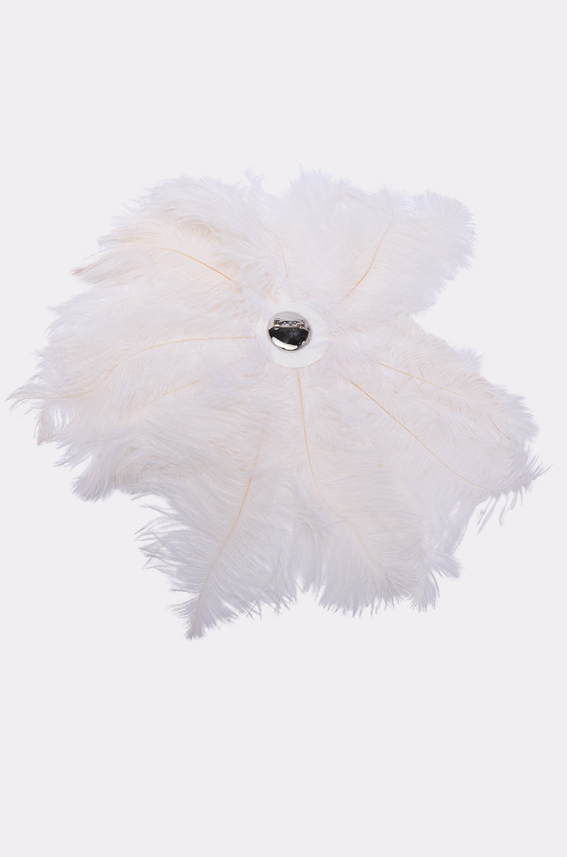 The TREAT YOURSELF FEATHER BROOCH features white ostrich feathers, a silver metal handle, and a gemstone center, shown fully open against a plain white background. 3