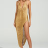 A woman wears a dazzling SOFIA FRINGE HIGH SLIT MIDI DRESS IN GOLD, featuring a deep neckline and high slit, paired perfectly with platform heels against a plain studio backdrop.