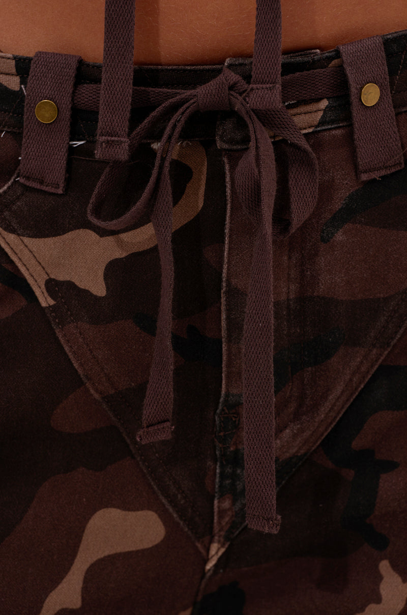 Close-up of CANT SEE ME BROWN CAMO CARGO JOGGER with a front tie, belt loops, two brass rivets on the waistband, high-rise fit, and adjustable ankle ties for a custom fit.