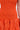 Close-up of the LET'S GO TO THE BEACH RUFFLE MINI DRESS IN ORANGE, showcasing intricate eyelet embroidery, smocked bodice details, and a ruffled skirt. Part of a person’s arm and torso are visible—ideal as a summer dress.