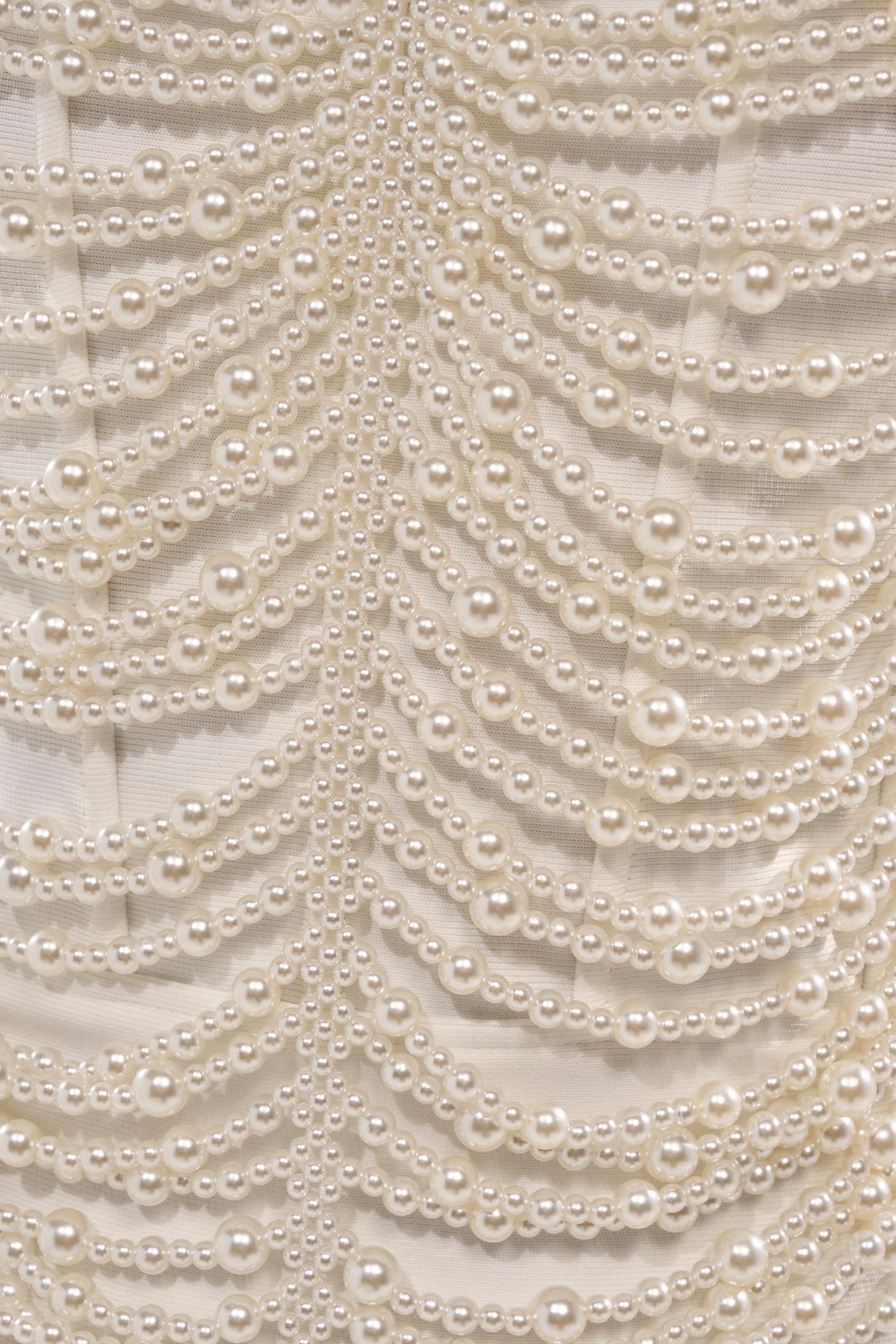 Rows of white pearls form elegant scalloped patterns on sheer beige fabric, making the DRESSED UP FOR THE BEST PEARL MAXI DRESS perfect for bridal celebrations or any special occasion. 6