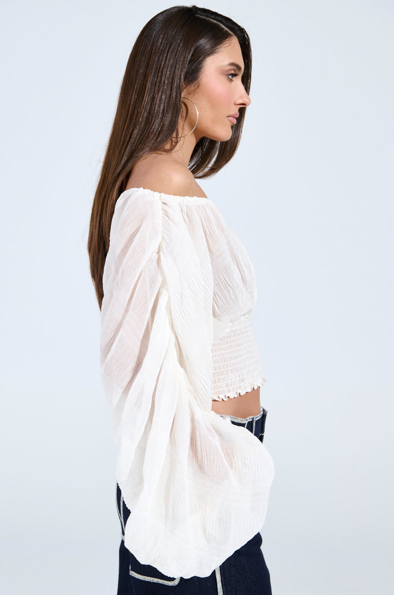 KOA FLOWY PLEATED LONG SLEEVE BLOUSE – AKIRA