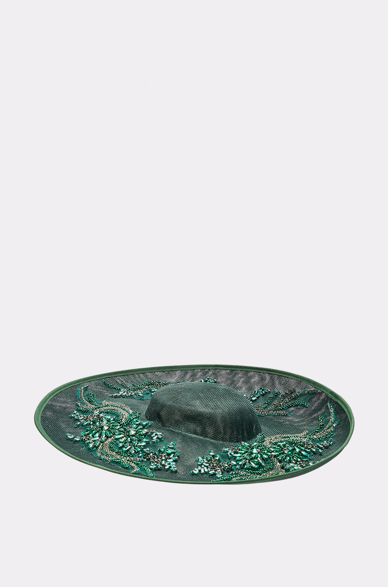 The NO ENVY CLIP ON HAT is an emerald green wide-brimmed hat featuring intricate bead and sequin embroidery, shown against a plain light gray background. 2