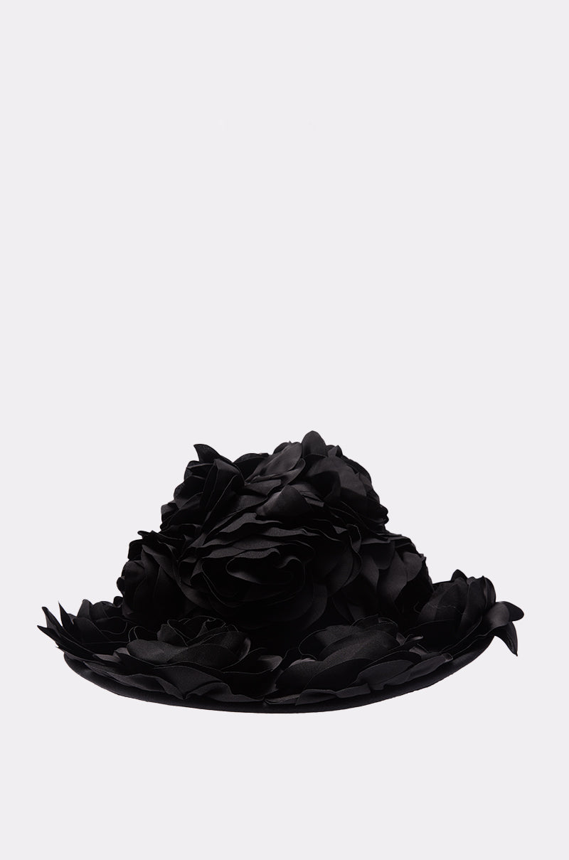 The DARK ROSE FLORAL COWBOY HAT is a wide-brimmed black gothic hat decorated with large layered fabric flowers and detailed 3D floral accents, shown against a plain white background. 3