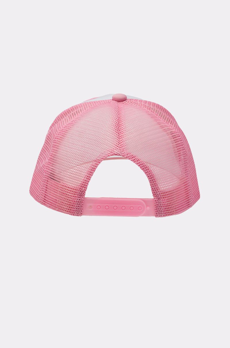 The CROSS ME PATCH HAT is a pink trucker hat shown from the back, featuring an adjustable plastic snap closure and a solid pink top button, making it stand out against a light gray background. 5
