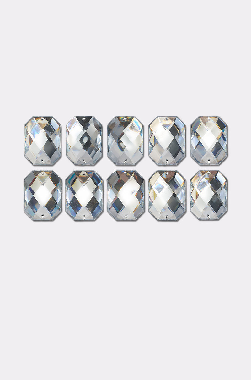 Ten clear, faceted octagonal crystals—each with a small hole near the edge—are arranged in two rows. Ideal for creating elegant hair accessories or barrette-style clips, as seen in the DIAMONDS DANCING HAIR CLIP SET. 2