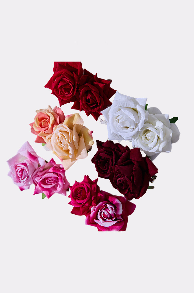 ROSES ARE RED HAIR CLIPS: A circle of artificial roses in red, white, pink, yellow, and burgundy on a plain white background—ideal for crafting romantic hair clips or floral accessories.