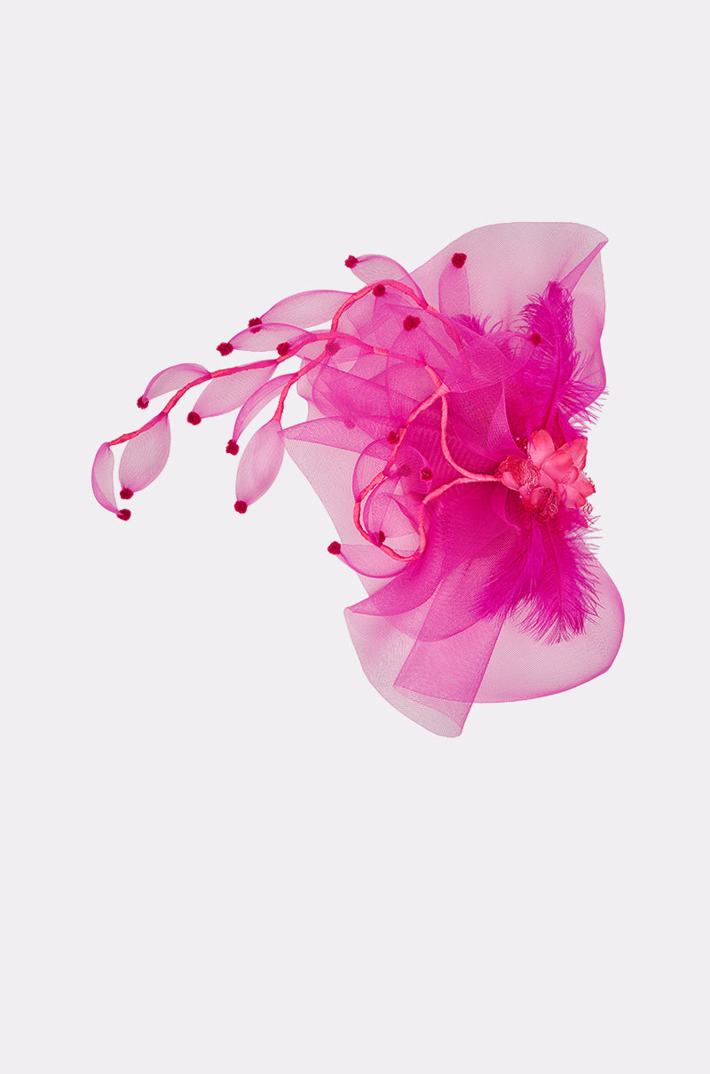 The RIRI HEADPIECE features vibrant hot pink sheer petals, feather accents, and delicate tendrils with small pom-poms arranged in an elegant design—an ideal festival accessory. 2