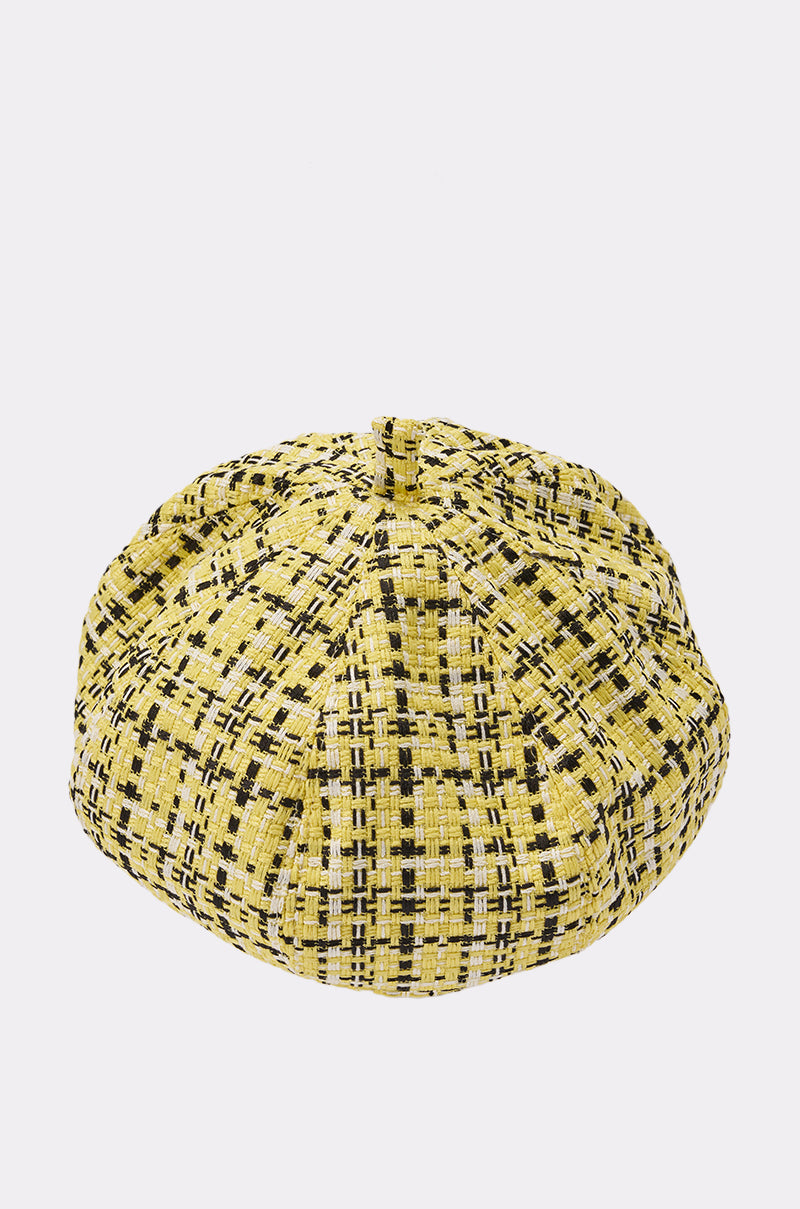 The MIA TWEED BERET is a yellow, round Parisian-style beret featuring black plaid on textured tweed fabric. Displayed against a plain white background. 5