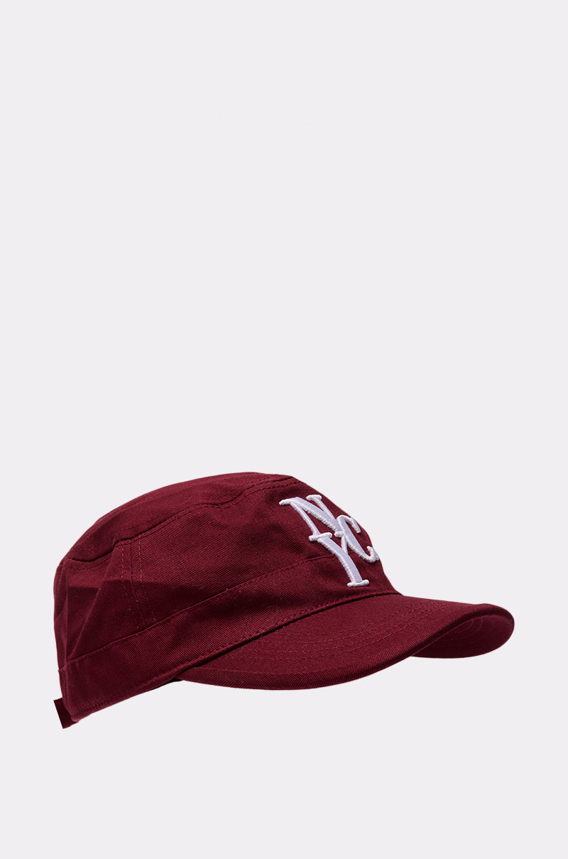 The CITY GURL HAT features a burgundy color, curved brim, and white “NYC” embroidery on the front, shown against a plain light gray background.