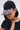 A woman in a bob haircut, lace-trimmed top, and sunglasses wears the NAILED IT HAT—a black ball cap featuring press-on nail embellishments on the brim—as she faces slightly downward in style.