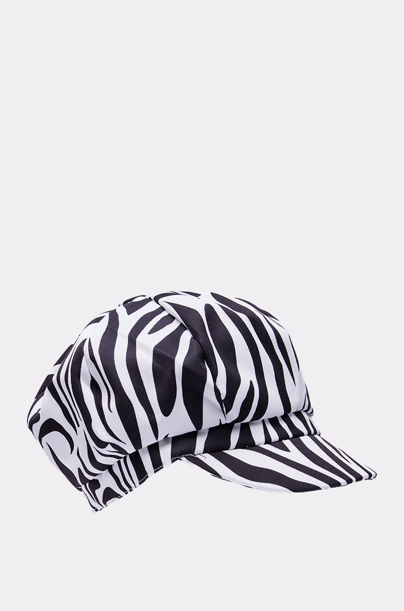 The ZEBRA LUXE BRIM HAT features bold black and white stripes in cotton, shown on a plain light background—ideal as a standout festival accessory. 3