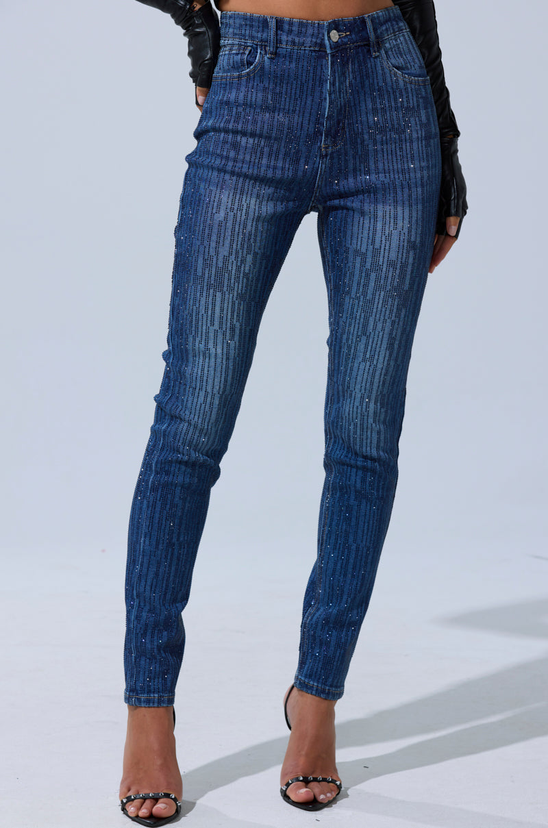 A person wearing SHINING STAR RHINESTONE WIDE LEG PANT stands against a plain light background.