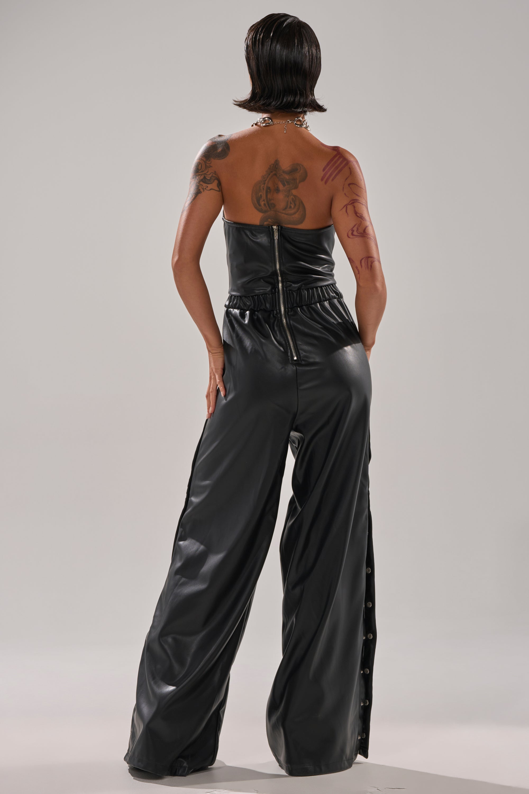 SEE YOU NEXT YEAR PU JUMPSUIT – AKIRA